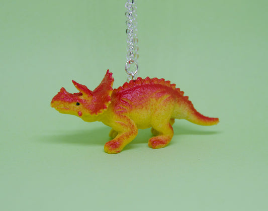 Halsband rödgul dinosaurie