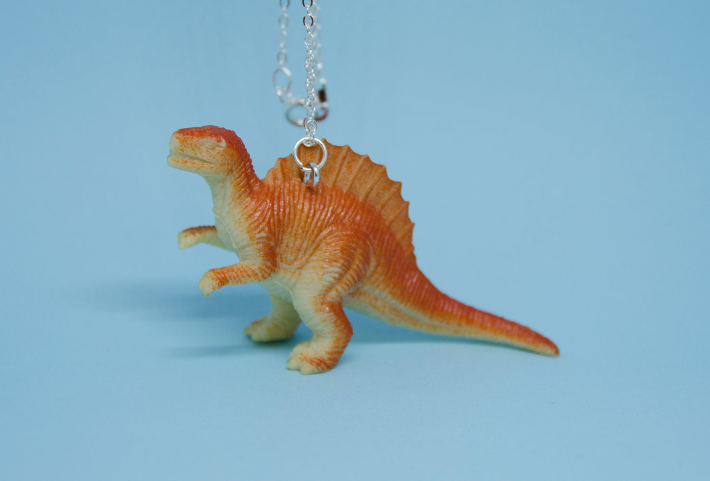 Halsband orange dinosaurie